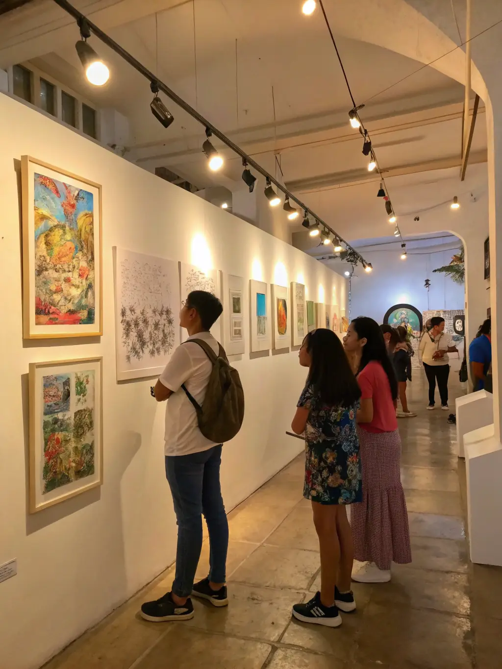 A photograph of an art gallery showcasing works by local artists, highlighting the diversity and talent within the community.